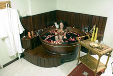 Woman Drinking Wine In Tub. Horizontal Royalty Free Stock Photo