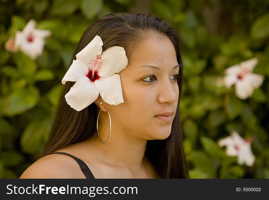 Beautiful Hawaiian Girl with Flower in Her Hair