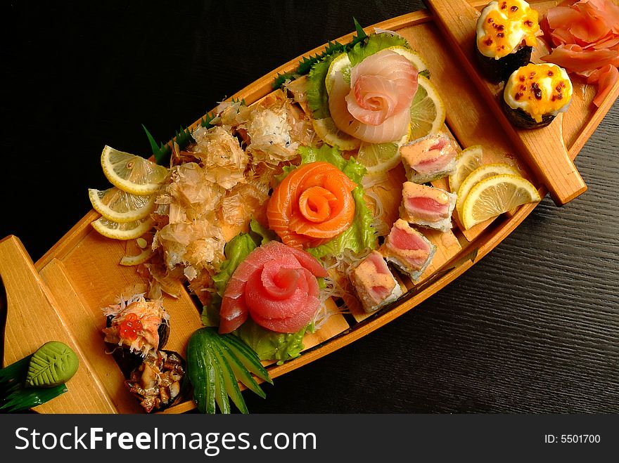 Various fish on a wooden tray