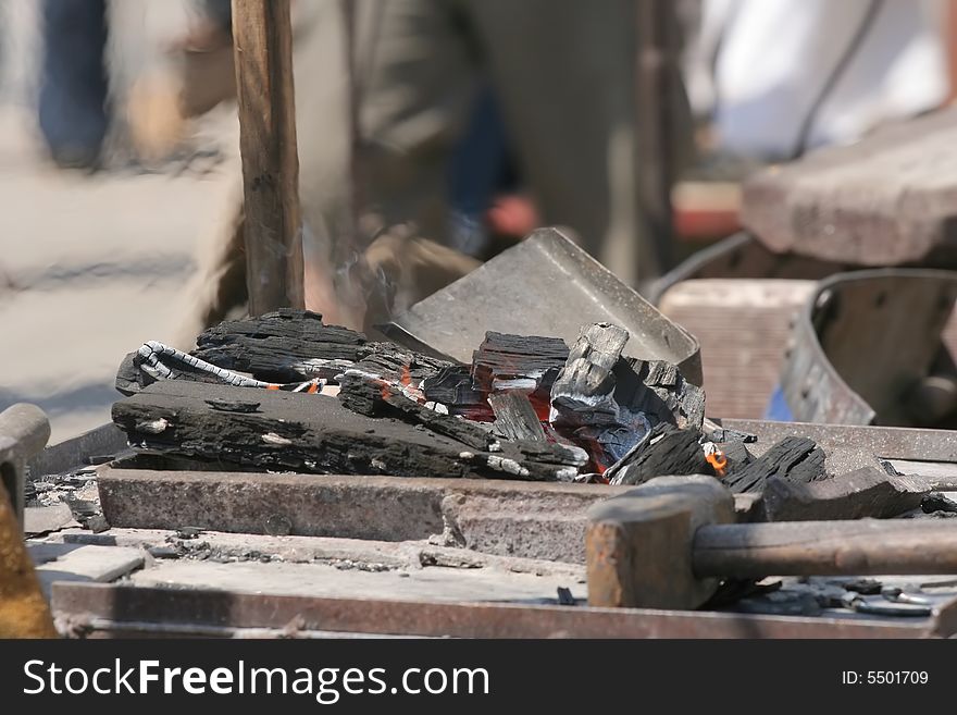 Blacksmith fire with different tools