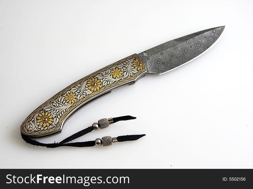 Attractive texture,stainless steel pocket knife isolated on the white background.