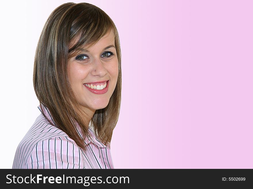 Young business girl over a white-pink background