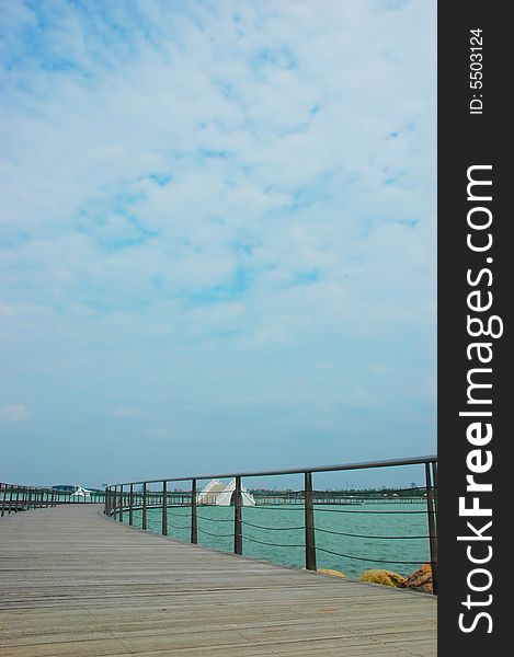 The bridge on the lake with the sky background