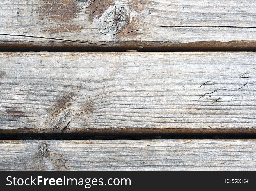 Old wood grating. Textured bacground. Close up. Old wood grating. Textured bacground. Close up.