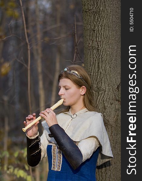 Portrait of the romantic girl in autumn forest. Portrait of the romantic girl in autumn forest