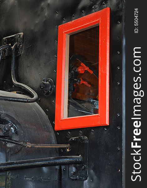 The red window of black locomotive