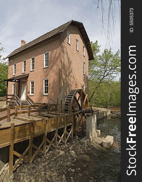 John Wood Grist Mill in the summer south view. John Wood Grist Mill in the summer south view