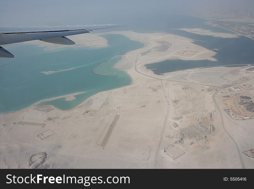 Aerial view of island construction in dubai. Aerial view of island construction in dubai