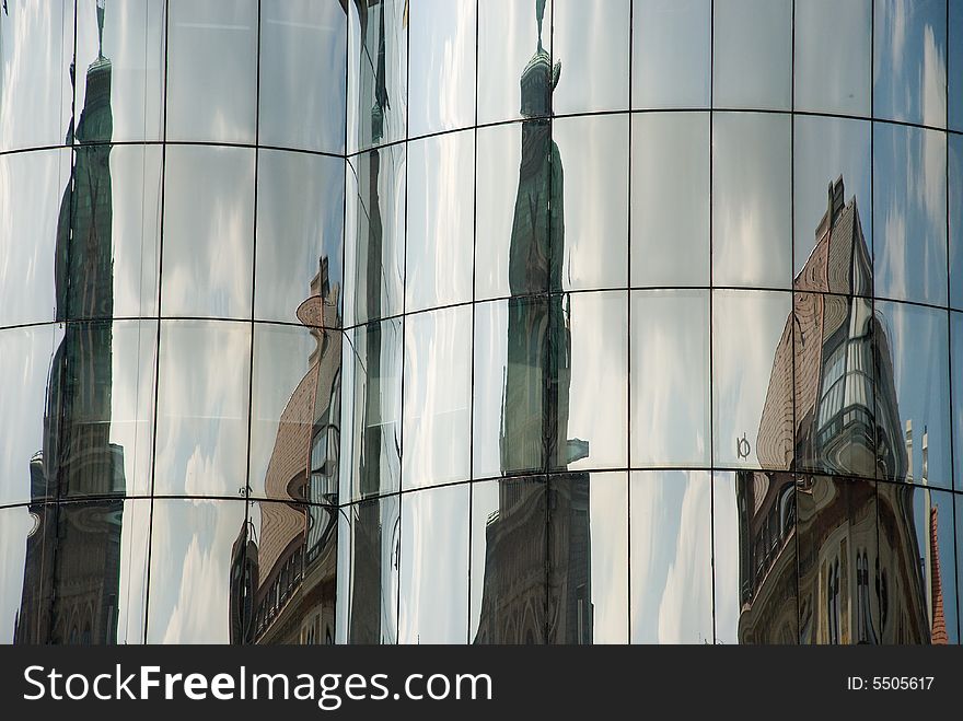 Mirroring towers in trade building windows. Mirroring towers in trade building windows