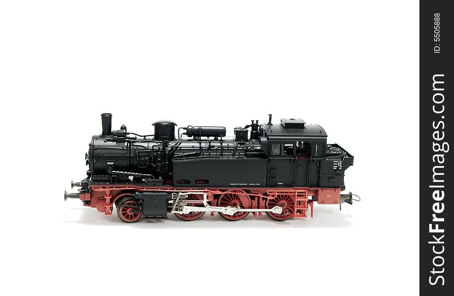 A model of a steam engine on white background