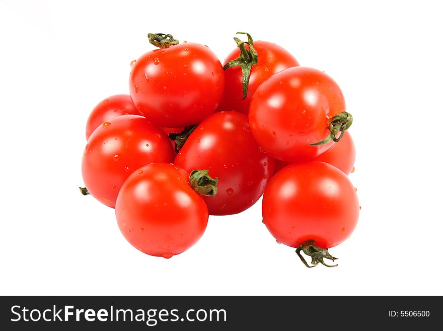 Tomatoes with water droplets on white background