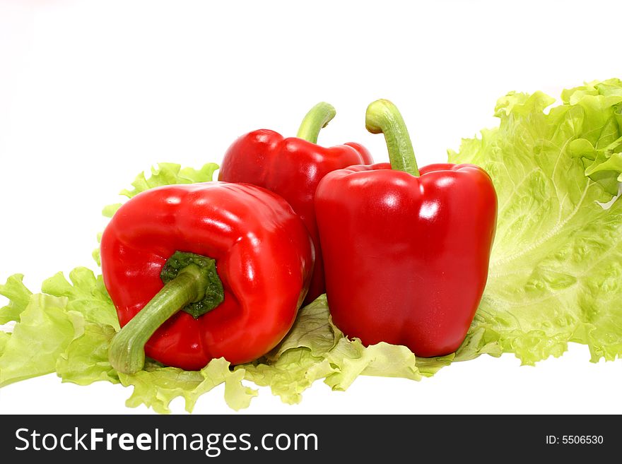 Red pepper and verdure on white background