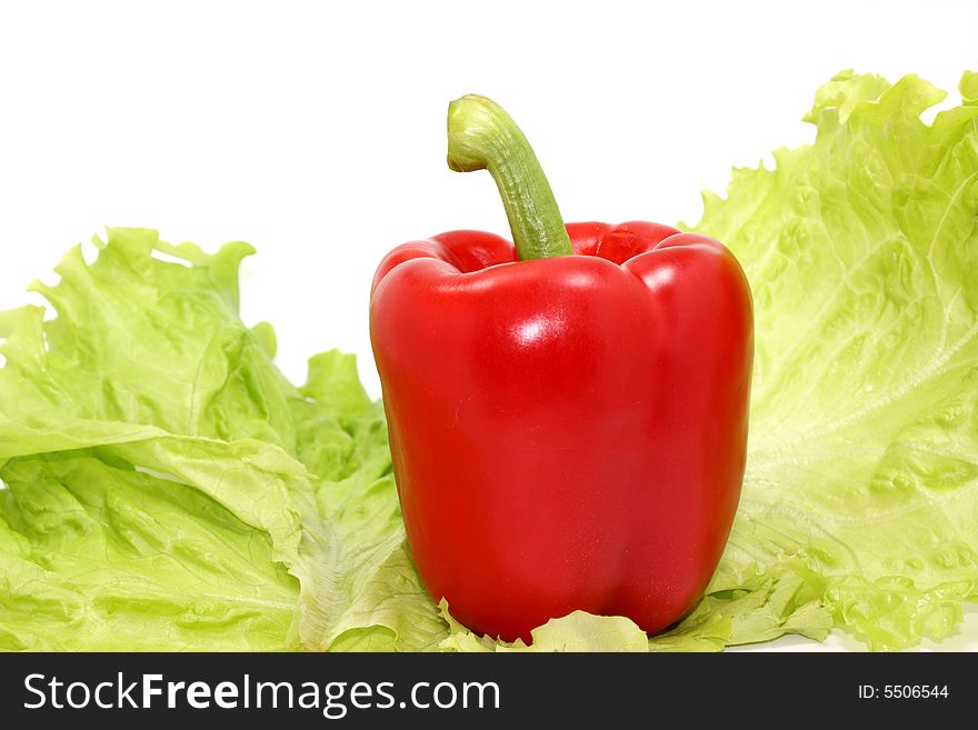 Red pepper and verdure on white background