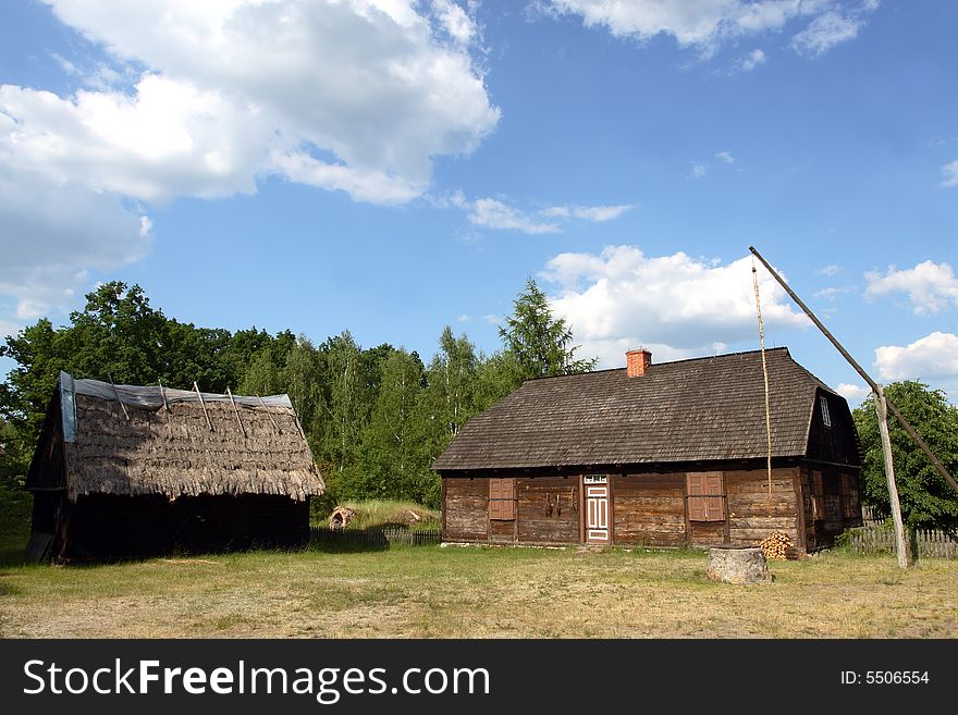 Old house with blue sky in background