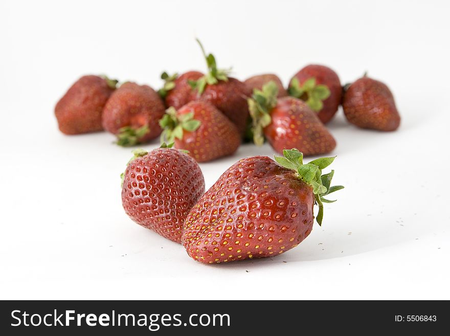 Some strawberries isolated on white