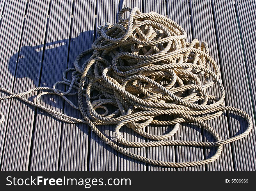 Coiled Pile of Rope on Dock. Coiled Pile of Rope on Dock