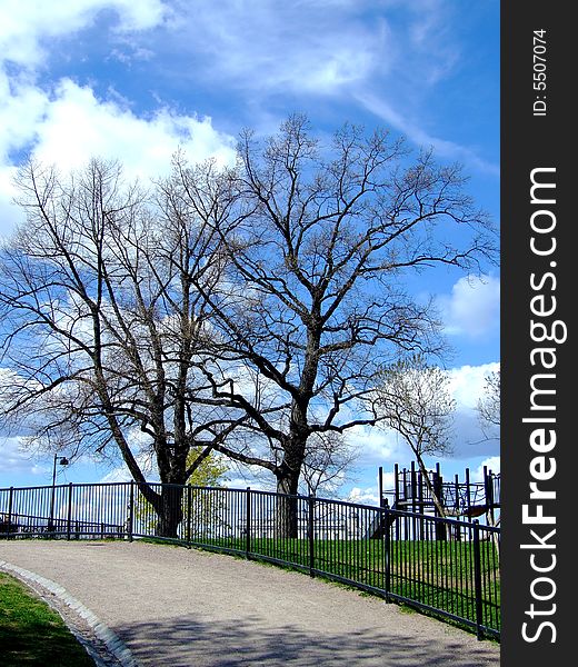 A walk in the park, a beautiful sky, children's playground. A walk in the park, a beautiful sky, children's playground