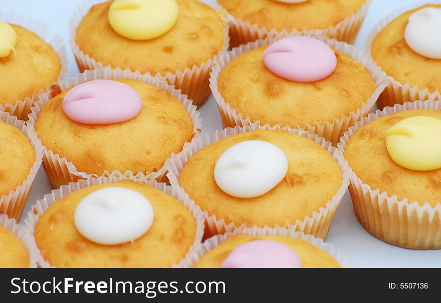 A shot of some pretty iced fairy cakes