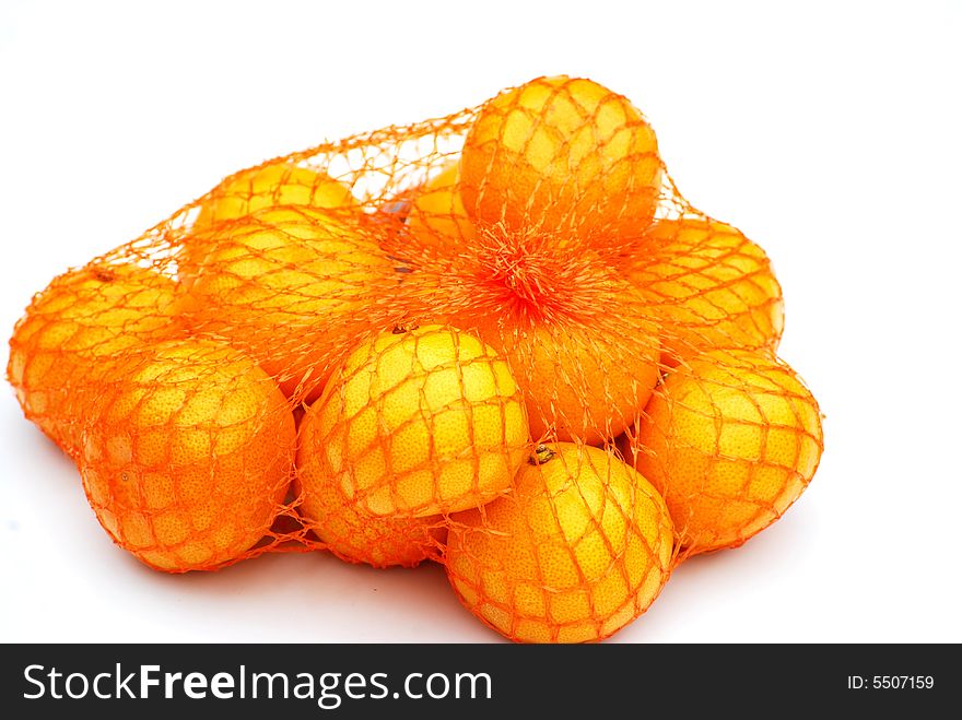 Shot of some satsumas in a net