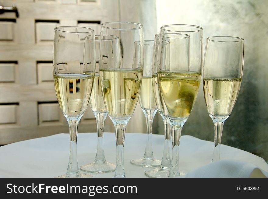 An image of glasses full of champagne. An image of glasses full of champagne