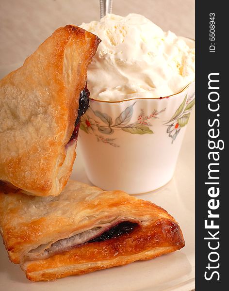 Blueberry turnovers with fresh whipped cream