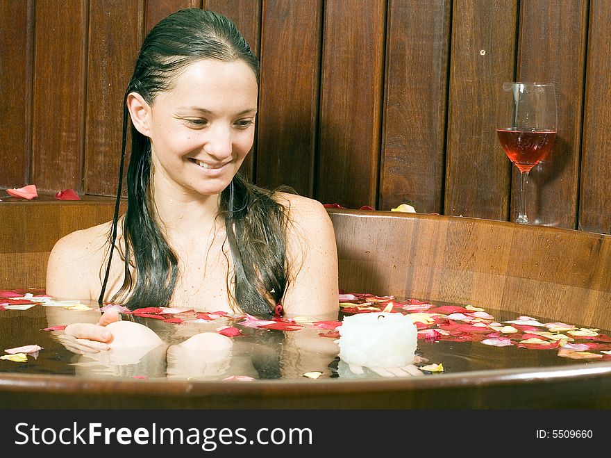 Woman In Tub With A Candle - Horizontal