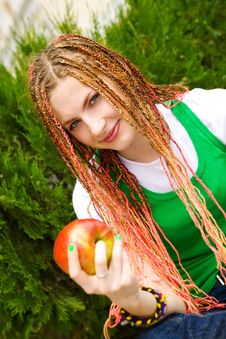 Girl With Red Apple Royalty Free Stock Photography
