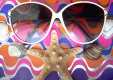 Solar Glasses And Different Seashells Royalty Free Stock Photography Solar Glasses And Different Seashells Royalty Free Stock Photography