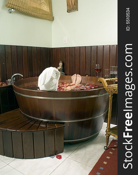Woman Soaking in Tub - Vertical