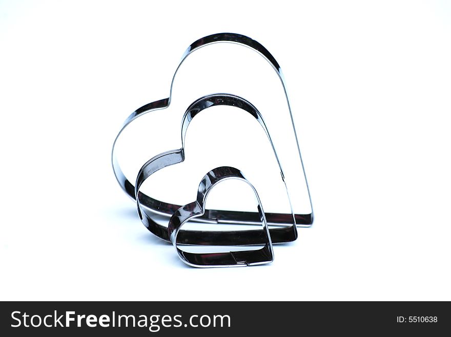 Shot of some heart shaped cookie cutters isolated on white