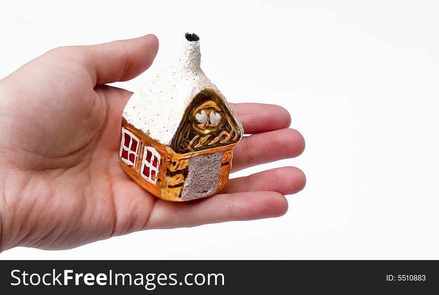 House on hand; white background