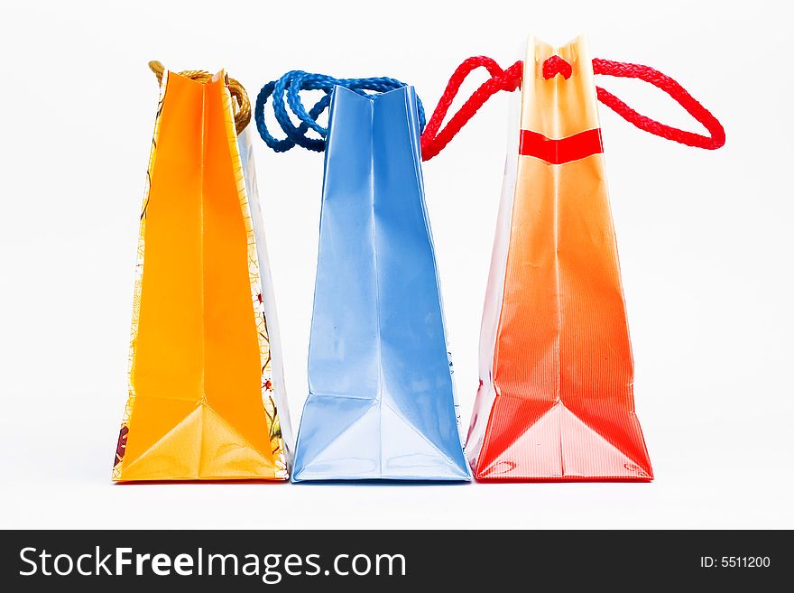 Christmas colorful paper bags isolated on white