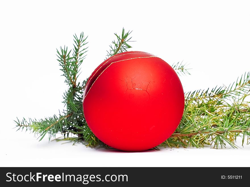 Christmas decoration - red ball and pine needles