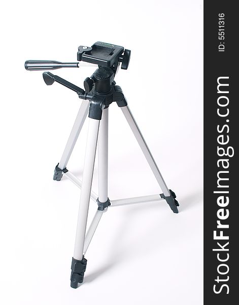 A brand new tripod on the white background.