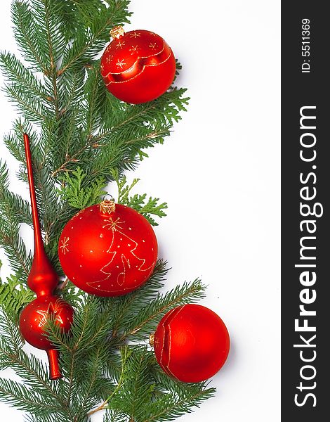 Christmas decoration/ frame - red balls and pine needles on white background