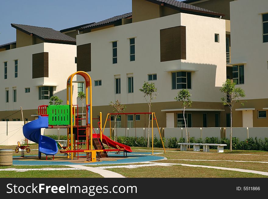 Newly constructed children playground infront of luxury home.