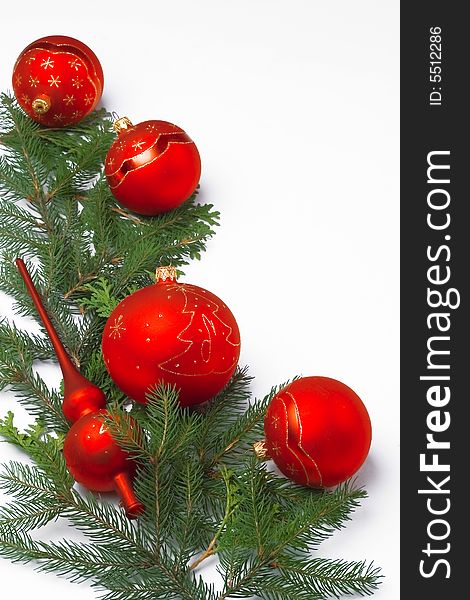 Christmas decoration/ frame - red balls and pine needles on white background