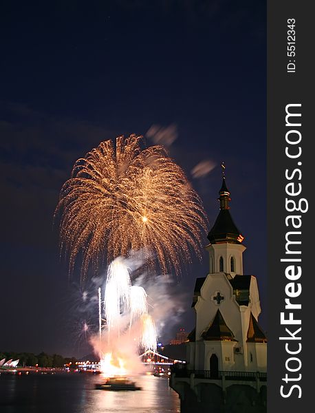 Firework and church on river
