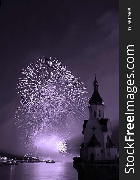 Firework festival on river Dniepr, Kiev, Ukraine. Black white photo with violet filter. Firework festival on river Dniepr, Kiev, Ukraine. Black white photo with violet filter.