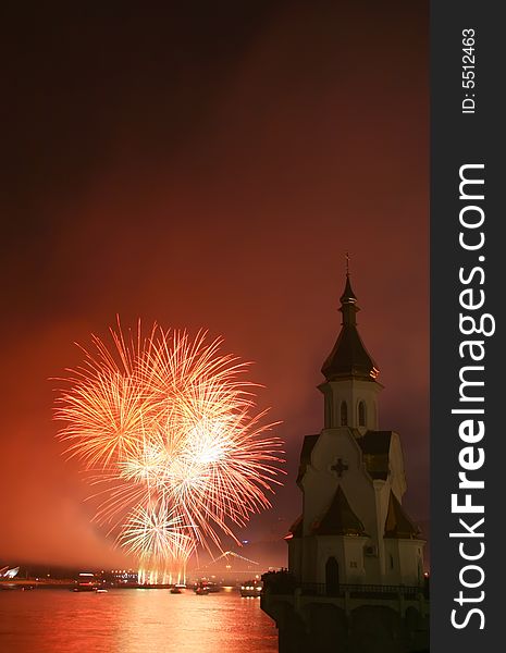 Firework and church on river