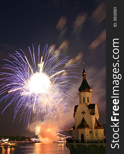 Firework and church on river