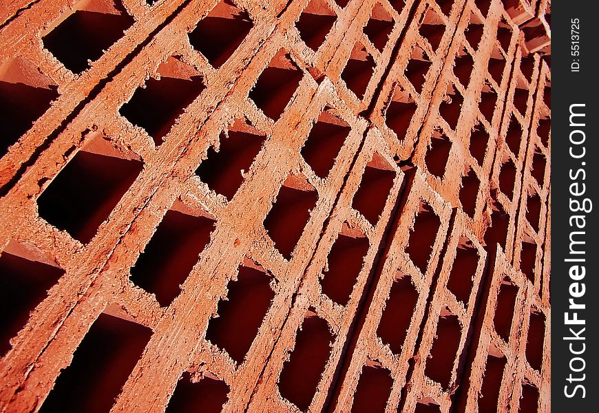 Detail of the holes of red bricks stacked. Detail of the holes of red bricks stacked
