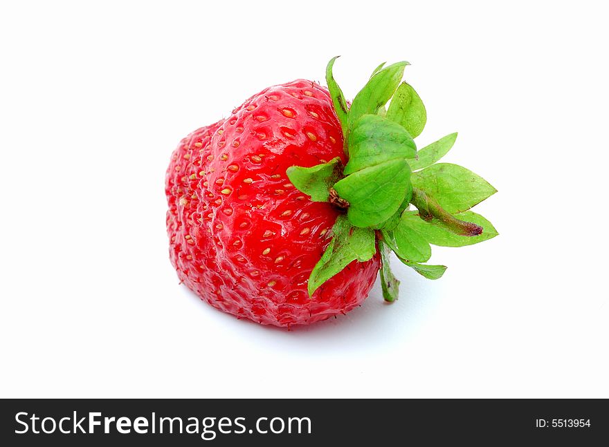 Delicious ripe strawberry on a white background.