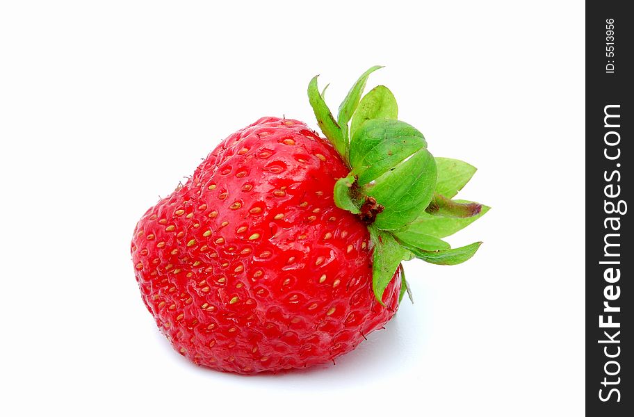 Delicious ripe strawberry on a white background.