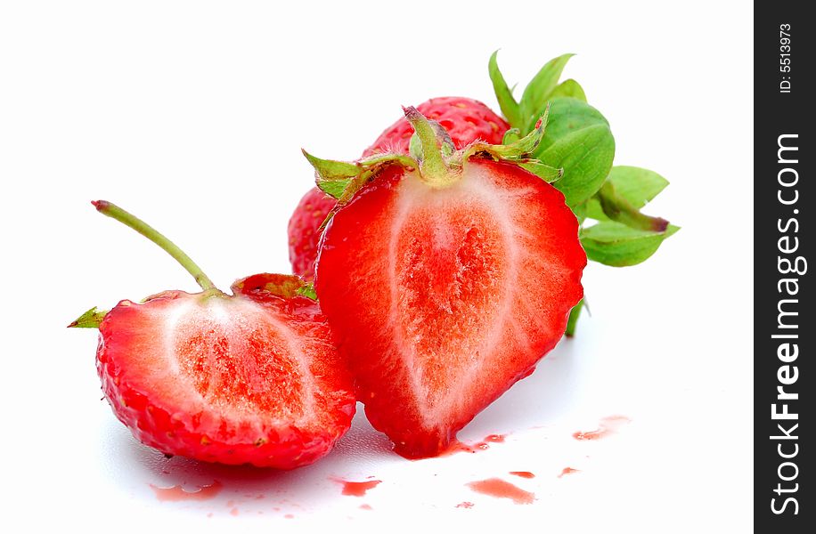 Delicious ripe strawberries on a white background.