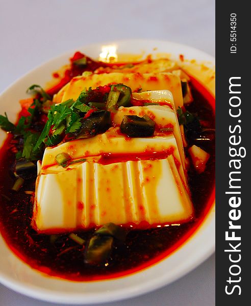 Delicious spicy tofu on table