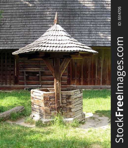 Ancient wooden well with a roof from Carpathians village(Ukraine)