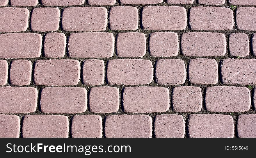 Put sidewalk tile of rectangular form from ceramics