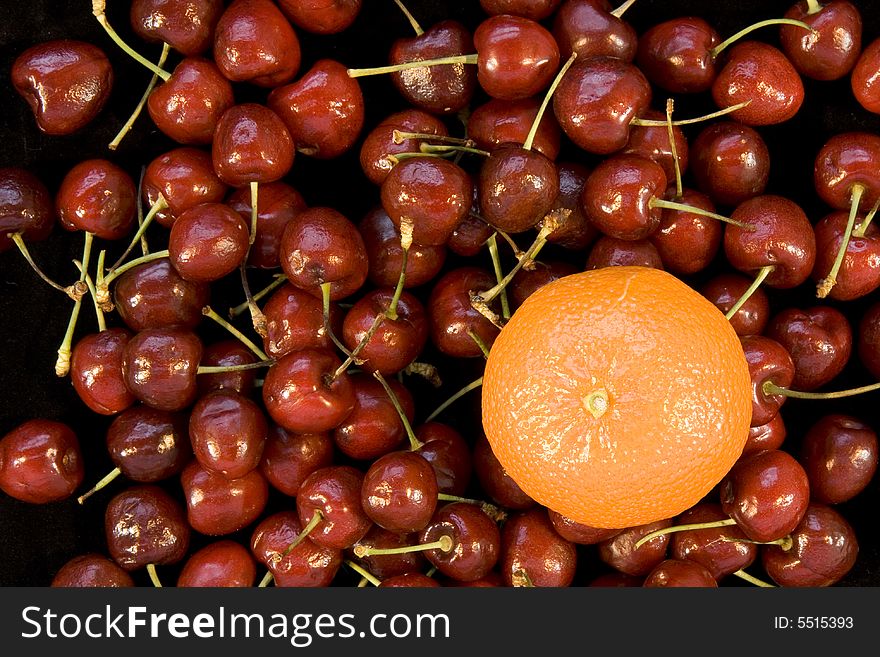 Multipe Cherries with single orange