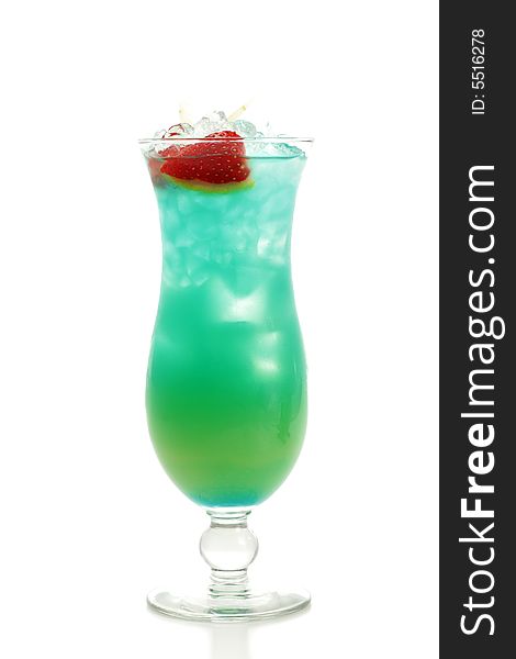 Tropical Acoholic Drink Made of Rum, Pineapple Juice, Blue Curacao, Sweet and Sour Mix. Slice of Apple and Strawberry as a Garnish. Tropical Acoholic Drink Made of Rum, Pineapple Juice, Blue Curacao, Sweet and Sour Mix. Slice of Apple and Strawberry as a Garnish.